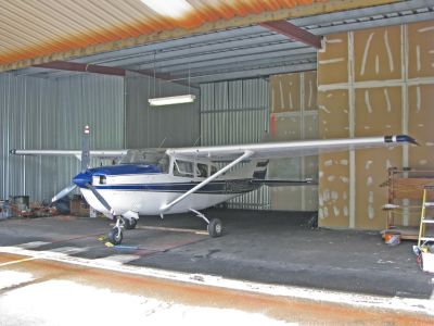 N756PY inside the Pine Hill hangar at BED